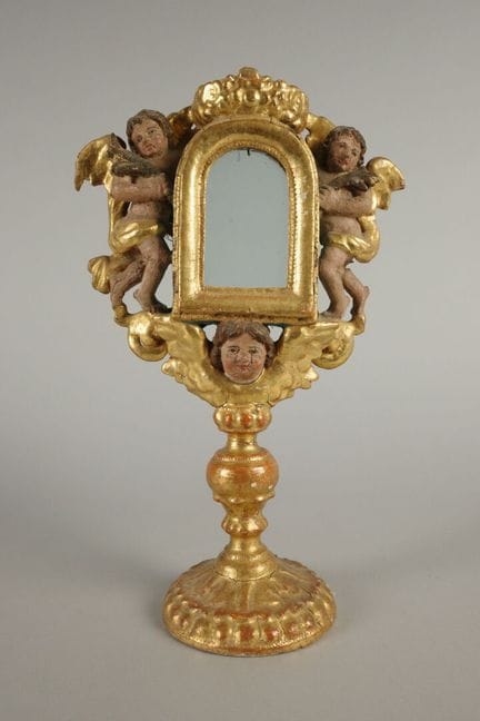 Monstrance reliquaire en bois sculpté doré et pein