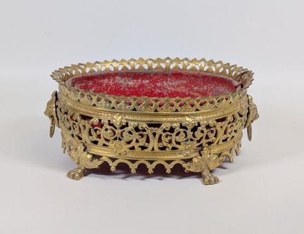 Fioriera ovale, a forma bombata, in bronzo dorato 