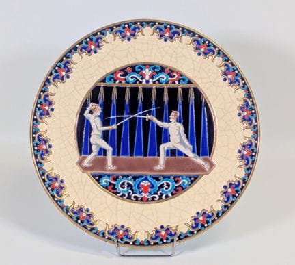 LONGWY, grande piatto rotondo in maiolica decorati