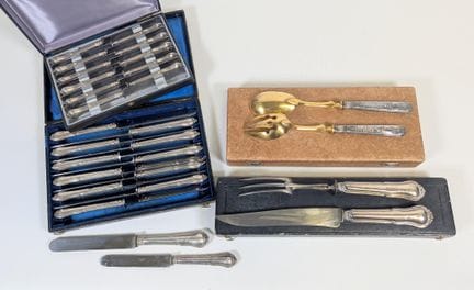 Ensemble de coutellerie, à manches en argent fourr