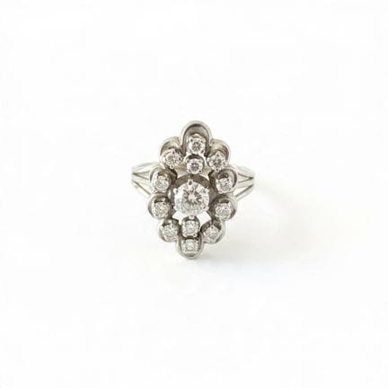 Marquise-cut ring in 750° white gold, set with a b