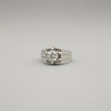 作品 法国 20世纪
750°白金印章戒指，镶嵌一颗约1.20克拉的现代明亮式切割钻石
总重量：12