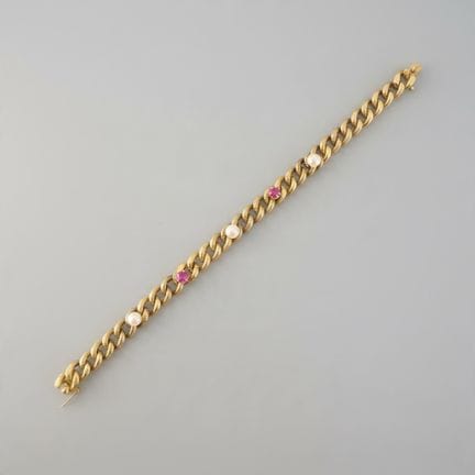 750° yellow gold BRACELET adorned with three pearl