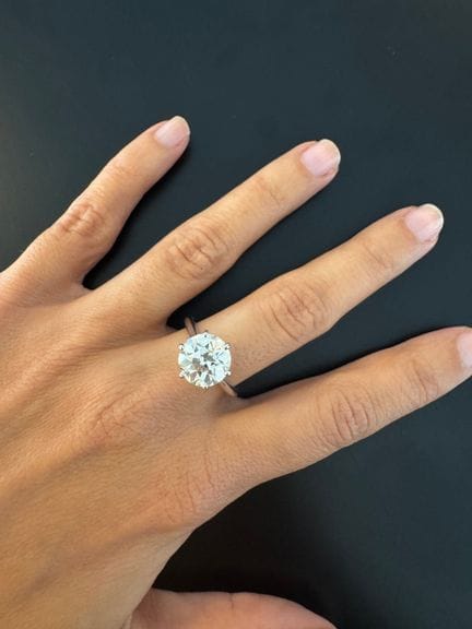 750° white gold solitaire ring set with an antique