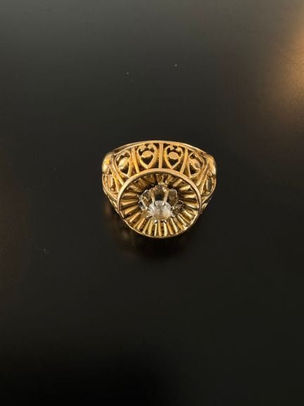 750° yellow gold RING set with a white stone
Gross