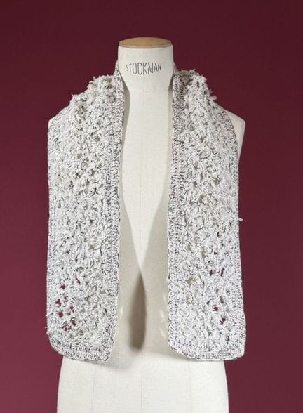 CHANEL
Black/white/pink/gray openwork cotton tweed