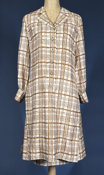 BALMAIN Boutique 
Mid-length white silk shirtdress