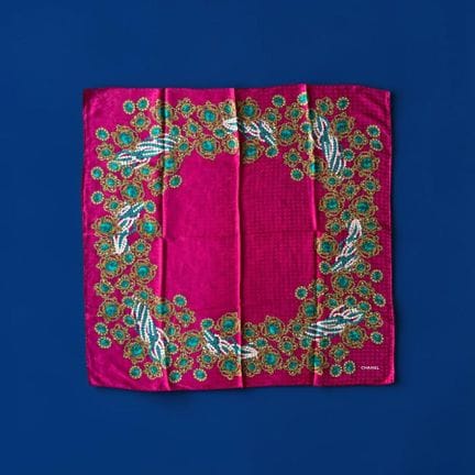 CHANEL 
Silk scarf featuring a jewel-inspired prin