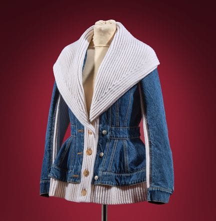 ALEXANDER McQUEEN 
Raw denim jacket with a wide ro