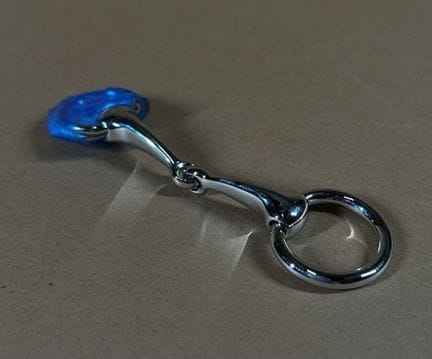 HERMÈS PARIS
Silver plated metal keychain featurin