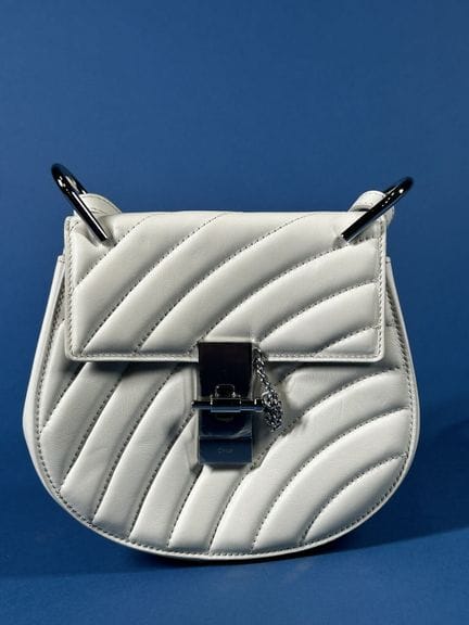 CHLOÉ  
Drew bag in ivory quilted leather with a t