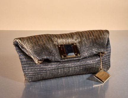 LOUIS VUITTON 
Altair clutch in black and gold-ton