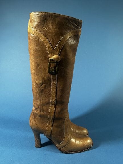 DOLCE &amp; GABBANA
Pair of distressed beige leath