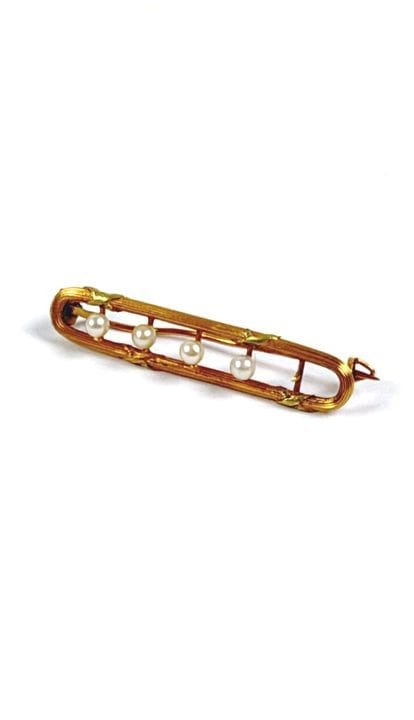 Piccola spilla in oro 18 carati (750 millesimi) tr