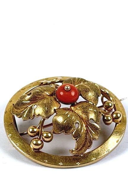 Spilla circolare in oro giallo 18 carati (750 mill