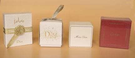 CHRISTIAN DIOR - CARTIER. Set of 4 miniature bottl
