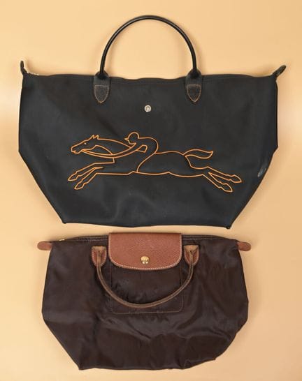 LONGCHAMP. Dos bolsos tipo cabas plegables de lona