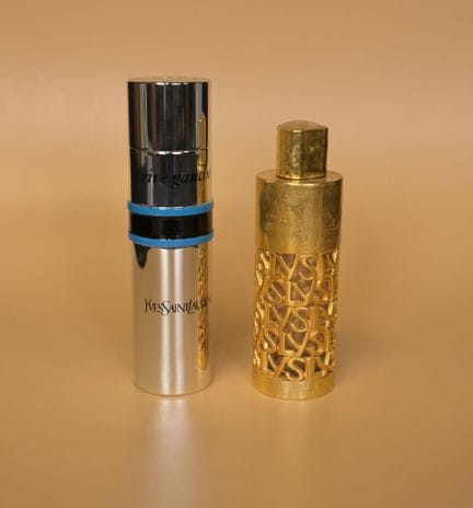 YVES SAINT LAURENT. Deux vaporisateurs de parfum, 