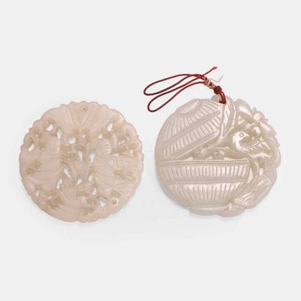 Two Chinese jade plaques, 19th century, of circula