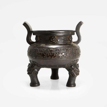 A Chinese bronze tripod incense burner, Ming dynas