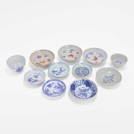 A collection of eleven Chinese blue and white cups