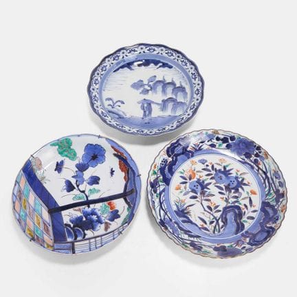 A collection of three Japanese blue and white plat