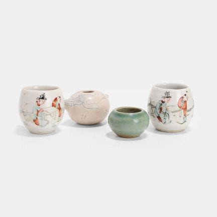 A group of four Chinese bird feeders, Ming to Qing