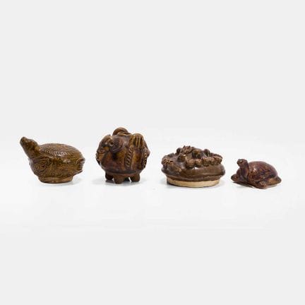 A collection of four Southeast Asian earthenware w