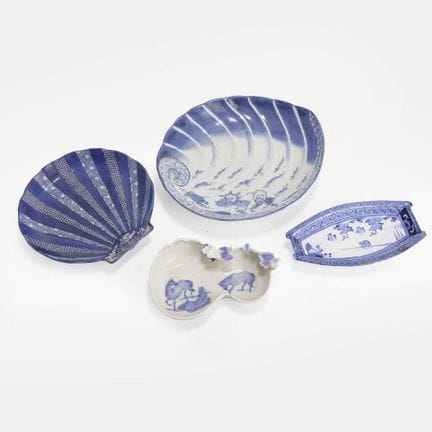 A collection of four Japanese blue and white plate