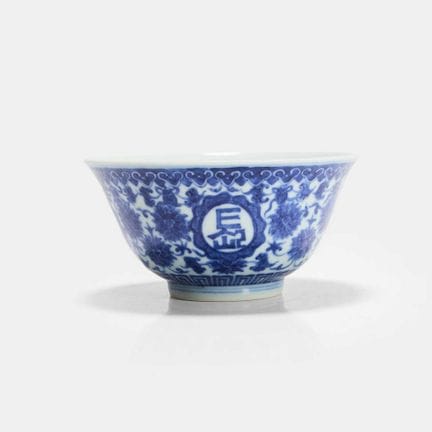 A Chinese blue and white bowl, the rounded sides r