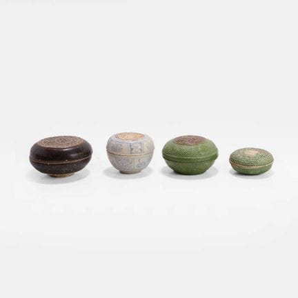 A collection of four Southeast Asian boxes and cov