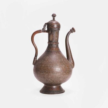 An Indian brass ewer, late 19th/early 20th century