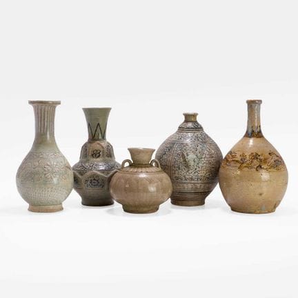 A group of Southeast Asian pottery vases, 14th-16t