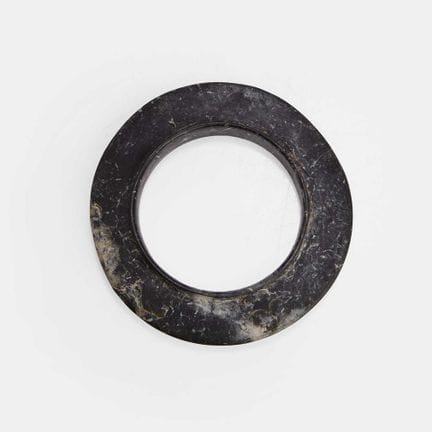 A Chinese collared jade disc, Shang dynasty (circa