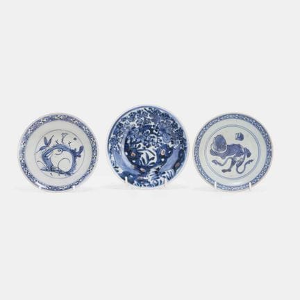 Three Chinese blue and white saucers, late Ming dy