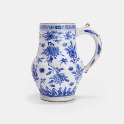 A Chinese blue and white jug, 18th century, the bo