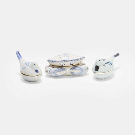 A group of Vietnamese blue and white boxes and cov