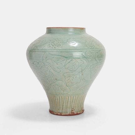 A Chinese celadon-glazed jar, Ming dynasty (1368-1