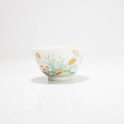 A Chinese famille rose bowl, the rounded sides ris