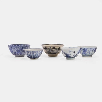 A collection of five Japanese blue and white bowls