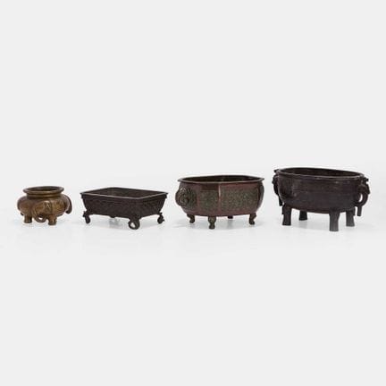 A group of four Japanese bronze koro, 20th century