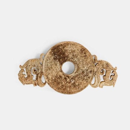A Chinese jade plaque, in the Warring States style
