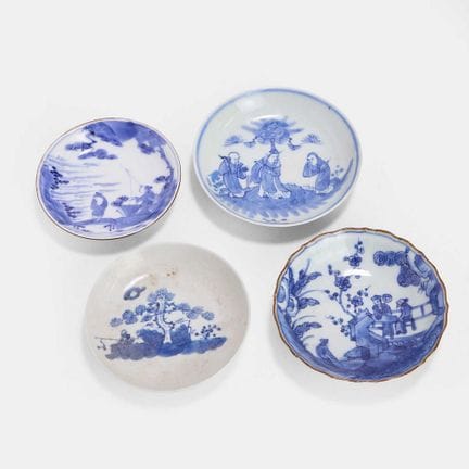 A collection of four Japanese blue and white sauce