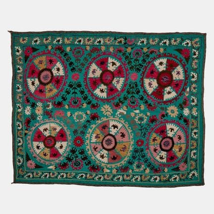 A silk embroidered suzani panel, early 20th centur
