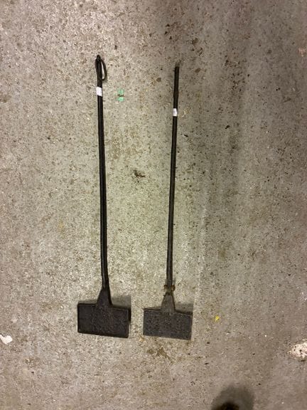 TWO WAFFLE IRONS made of wrought iron with stylize