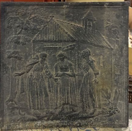 KAMINPLATTE aus Gusseisen mit Figurenverzierung
65