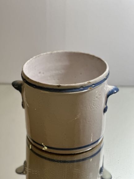 Set including:
- TWO earthenware vases with printe