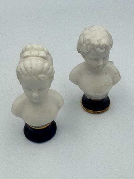 TWO CHILDREN'S BUSTES made of biscuit porcelain an