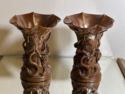 FOUR VASES with handles, decorated with vine leave