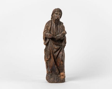 Saint évangéliste en noyer sculpté avec restes de 